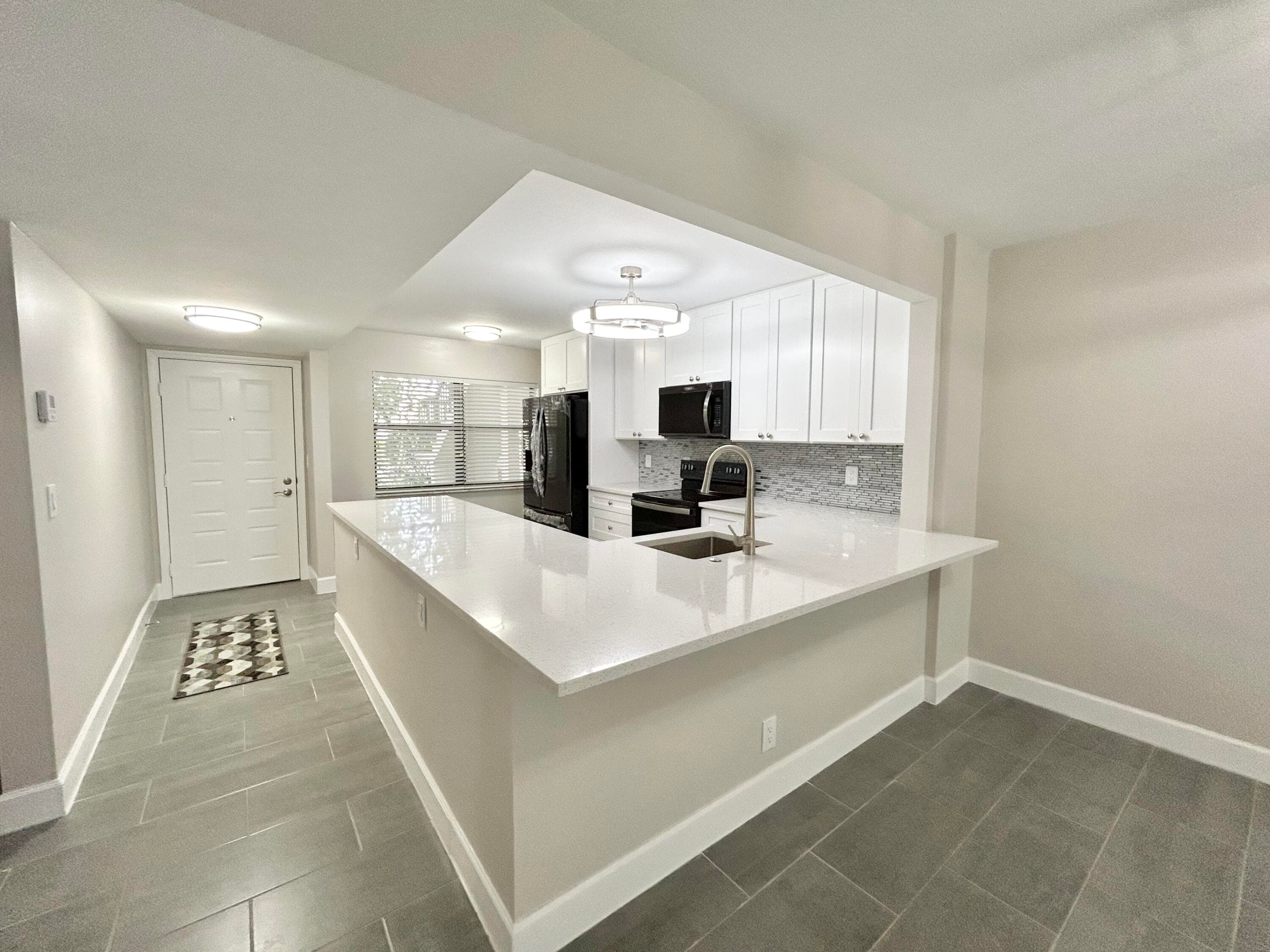 7681 Tahiti Lane Unit 102, Lake Worth
